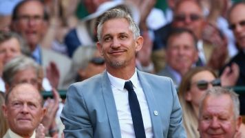 Gary Lineker is introduced to Centre Court during day six of the Wimbledon Lawn Tennis Championships at the All England Lawn Tennis and Croquet Club on July 4, 2015 in London, England.