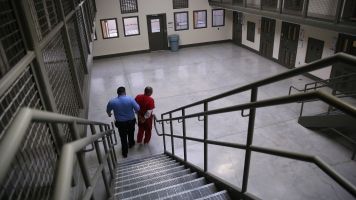 Guard and immigrant detainee in ICE detention facility