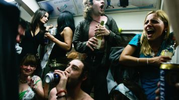 People drinking on the London Underground
