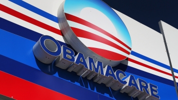 An Obamacare sign is seen on the UniVista Insurance company office.