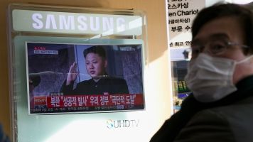 North Korean leader Kim Jong-un on a television screen