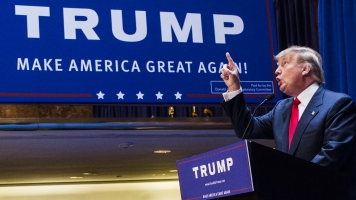 Donald Trump points as he gives a speech as he announces his candidacy for the U.S. presidency.