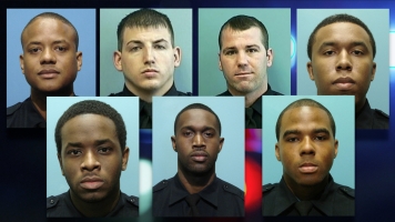 Photos of the seven officers indicted on conspiracy charges