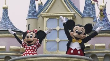 Costumed Mickey and Minnie characters at Hong Kong Disneyland.