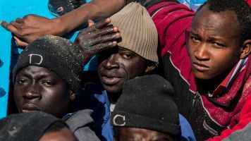 Migrants aboard ship in Mediterranean Sea