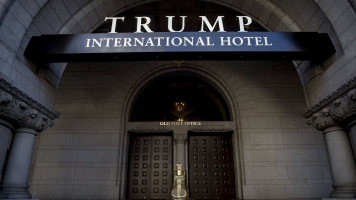 Artist Projects 'Pay Trump Bribes Here' On Trump International Hotel