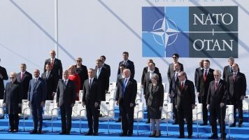 World leaders gather together at a NATO summit.