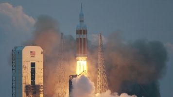 Orion spacecraft takes off from launchpad.