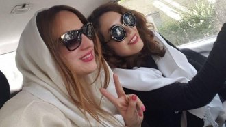 Women in Iran participate in protest campaign