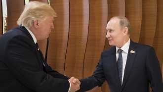 Donald Trump and Vladimir Putin meet at the G-20 summit.