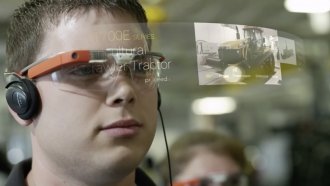 An AGCO employee uses Google Glass at work