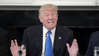 Amid Health Care Fight, Trump Says Insurance Costs '$12 A Year'