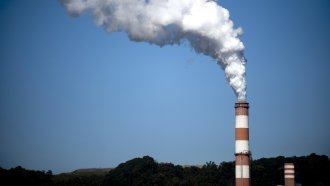 A plume of exhaust exists a smokestack at Mitchell Power Station, a coal-fired power plant near Pittsburgh