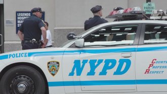 NYPD car and officers