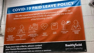 Paid leave policy sign in Smithfield plant