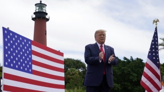 President Donald Trump arrives to speak on the environment at the Jupiter Inlet Lighthouse and Museum