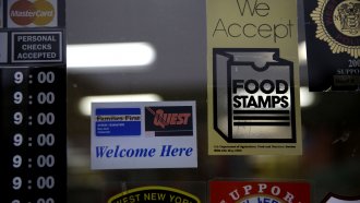"We accept food stamps" sign