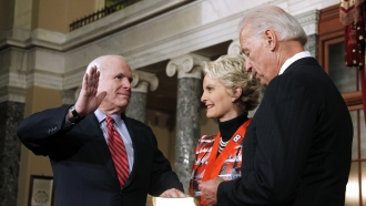 Then-Vice President Joe Biden Conducts a Swearing-in Ceremony for the late Sen. John McCain with his wife, Cindy, in 2011