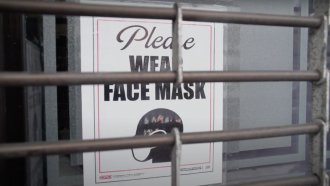 Sign encouraging mask-wearing