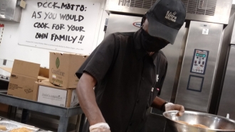 An employee prepares meals at DC Central Kitchen.