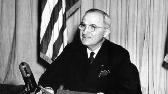 Truman announcing the Allied armies won an unconditional surrender from German forces on all fronts in 1945.