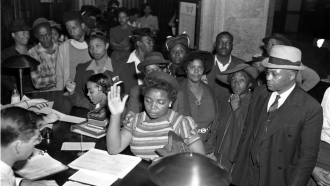American blacks register to vote in the July 4 Georgia Democratic Primary in Atlanta, Ga., on May 3, 1944