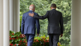 President Barack Obama walks with Vice President Joe Biden back to the Oval Office of the White House.