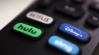file photo, the logos for Netflix, Hulu, Disney Plus and Sling TV