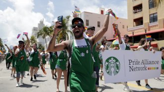 Starbucks employees in a Pride parade