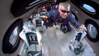 Sir Richard Branson floating in zero gravity