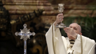 Pope Francis celebrates a Chrism Mass inside St. Peter's Basilica