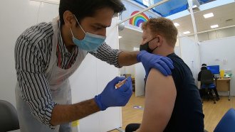 Care provider administers vaccine