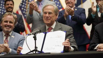 Texas Governor Signs Controversial Voting Bill Into Law