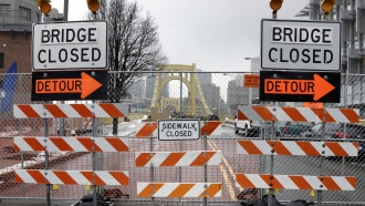 Bridge closed and detour signs
