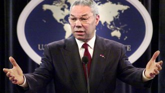 Former Secretary of State Colin Powell talks at a news conference in 2001.