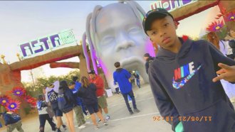 Ezra Blount, 9, poses outside the Astroworld music festival