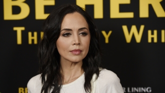Eliza Dushku poses at the premiere of the film "Be Here Now (The Andy Whitfield Story)."