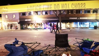 Portable chairs on the ground after an SUV drove into a parade of Christmas marchers.