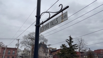 A street sign for Bedford Falls Blvd.