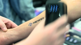 A color, custom tattoo printer at 2022's Consumer Electronics Show