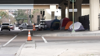 Homeless people have tents set up