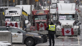 Police barricade in front of Canadian convoy protesting COVID-19 mandates