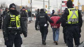 Protester is arrested by Canadian police