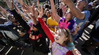 Child celebrates Mardi Gras in New Orleans