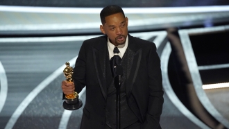 Will Smith cries as he accepts the award for best performance by an actor in a leading role for "King Richard" at the Oscars