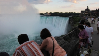 Tourists look upon Niagara Falls