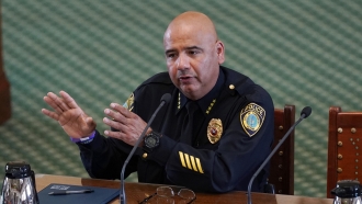 Elmendorf Police Chief Marco Pena testifies on the second day of a hearing in the Texas state senate chamber.
