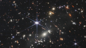 Galaxy cluster SMACS 0723, captured by the James Webb Space Telescope, is shown.