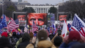 Supporters of President Donald Trump supporters attend a rally near the White House