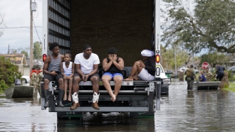 People are evacuated from floodwaters in the aftermath of Hurricane Ida in LaPlace, LA.